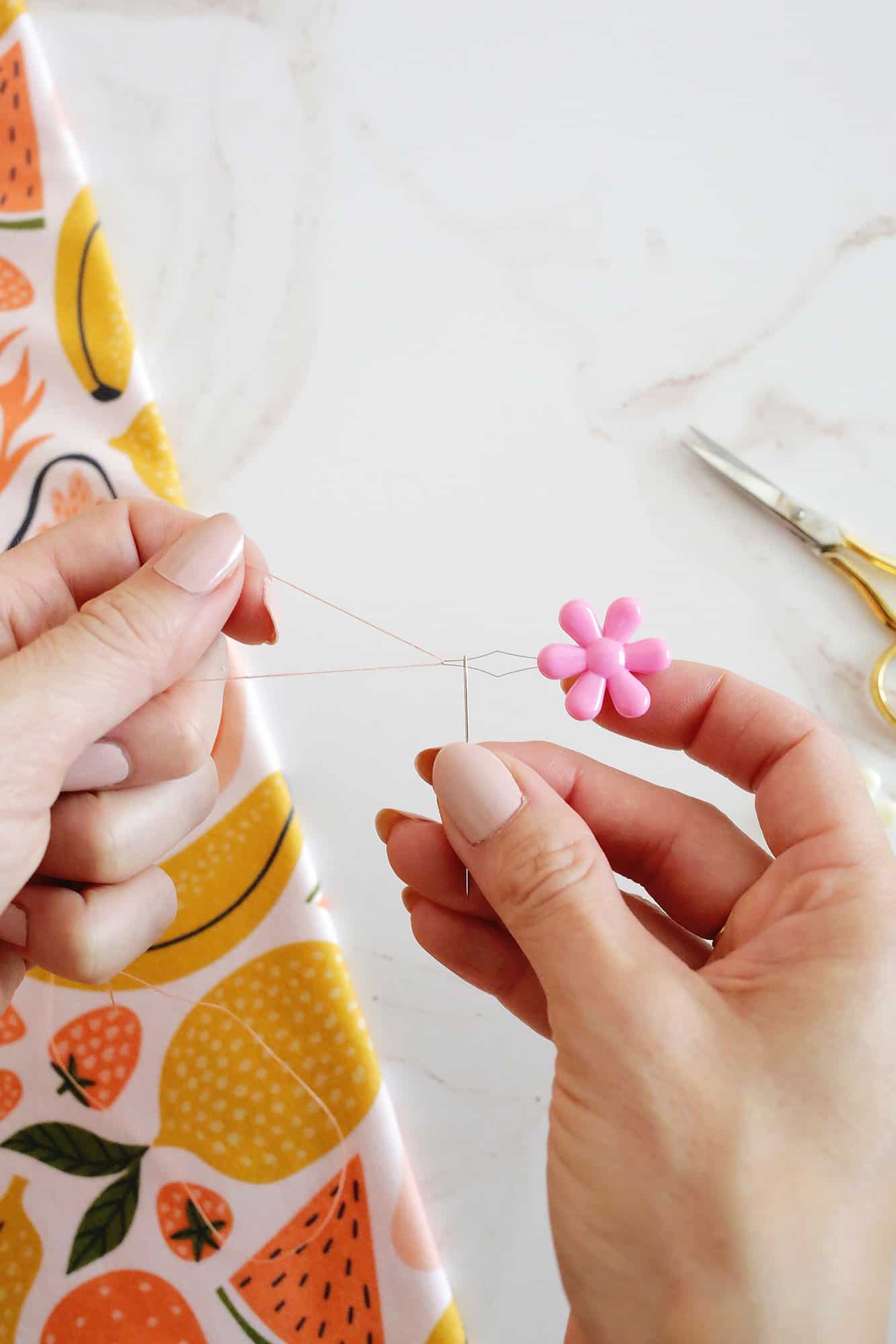 thread threaded through a needle threader