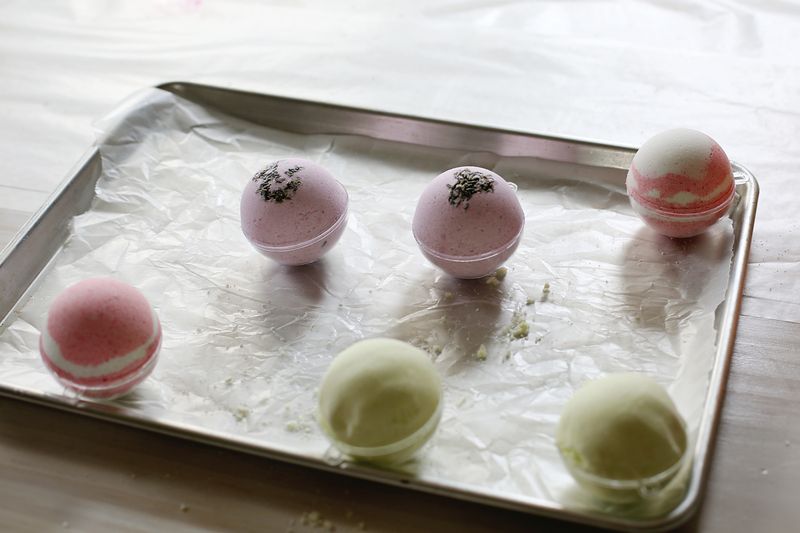 6 homemade bath bombs on a baking sheet